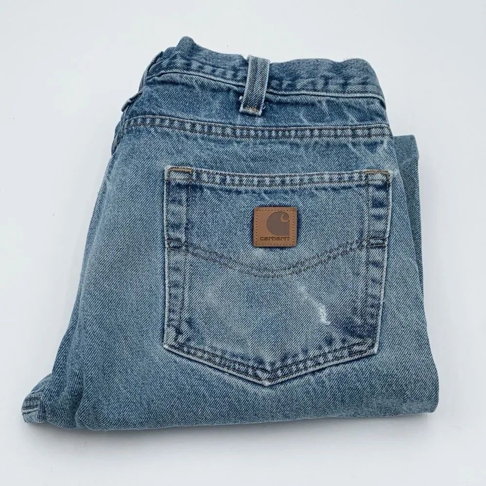 Carhartt Men's Light Blue Denim work wear distressed and worn in size 32x32